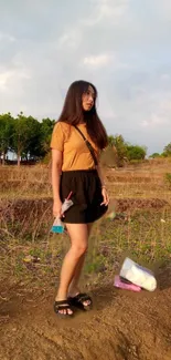 Girl walking down a sunlit path in nature, evoking calm and serenity in golden light.