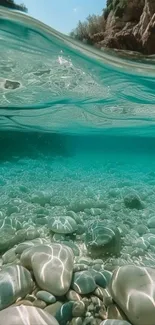 Tranquil underwater view with pebbles and clear water.