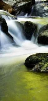 Serene waterfall stream over mossy rocks mobile wallpaper.