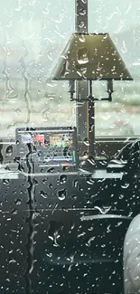 Workspace by window with city view and laptop.