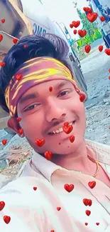 Stylish young man with bandana, smiling outdoors.