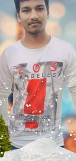 Young man in Los Angeles tee with cityscape background.