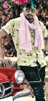 Stylish man in sunglasses with red vintage car.