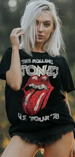 Fashionable woman in rock band t-shirt on mobile wallpaper.