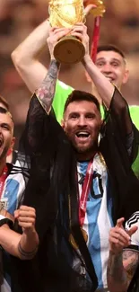 Football team celebrating victory with trophy.