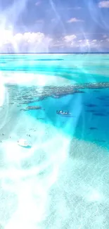 Aerial view of a tropical beach with turquoise water and white sand.