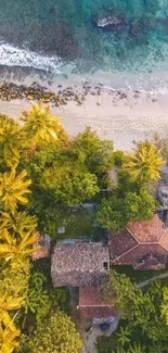 Aerial view of a tropical beach with lush greenery and turquoise ocean waters.