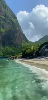 Tropical beach with mountains and turquoise sea.