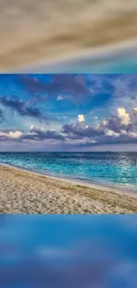 Serene tropical beach with azure ocean and fluffy clouds under a clear sky.