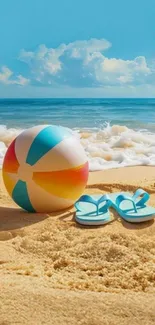 Beach scene with ball, flip-flops, and ocean.