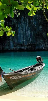 Tropical beach with a traditional longtail boat on turquoise water.