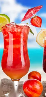 Vibrant tropical cocktails with fruit, on a beach with blue sky.