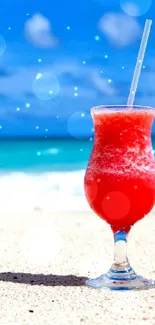 Tropical beach with red drink and blue skies wallpaper.