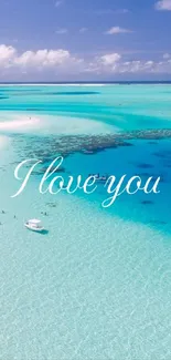 Tropical beach with 'I love you' text overlay, serene ocean view.