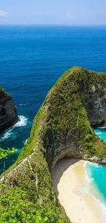 Tropical island beach with turquoise waters and lush green cliffs.