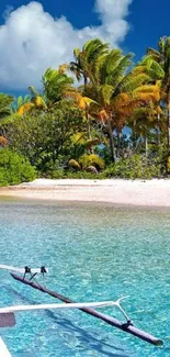 Tropical beach with palms and blue water.