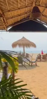 Tropical beach with straw umbrellas and coastal scenery.