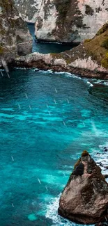 Tropical beach scene with cliffs and turquoise waters.