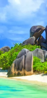 Tropical beach with rocks and lush greenery under azure sky.