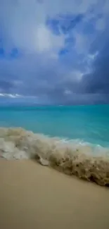 Turquoise waters and sandy beach under a partly cloudy sky.