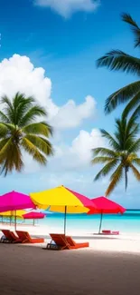 Tropical beach with palm trees and bright umbrellas.