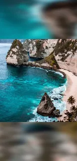 Tropical beach with clear blue waters and rocky cliffs.