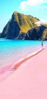 Tropical beach with pink sand and turquoise waters under blue sky.