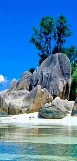 Stunning tropical beach with cliffs and greenery under a vibrant blue sky.