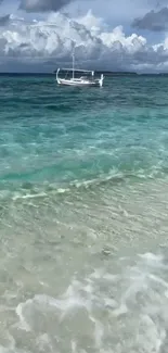 Tropical beach with turquoise water and a distant boat under cloudy skies.