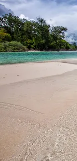 Serene tropical beach with turquoise waters and lush green trees.