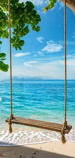 Swing on tropical beach with azure sea