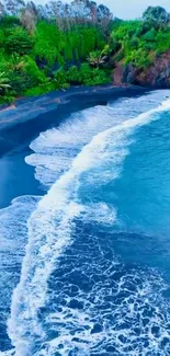 Tropical coastline with black sand beach and azure blue ocean waves.