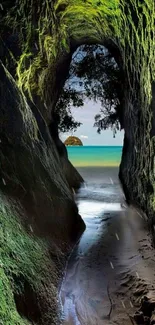 Tropical cave leading to a turquoise beach view, surrounded by lush greenery.