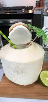 Tropical coconut cocktail with lime and garnish.