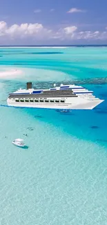 Luxury cruise ship on turquoise waters with a tropical beach.