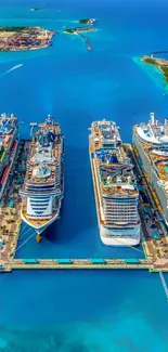 Aerial view of cruise ships docked at a tropical island harbor.