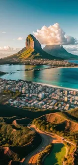 Aerial view of a tropical island with mountains, lush greenery, and turquoise waters.