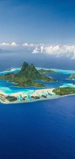 Aerial view of a tropical island with blue ocean.