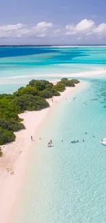 Tropical beach with turquoise water and white sand.