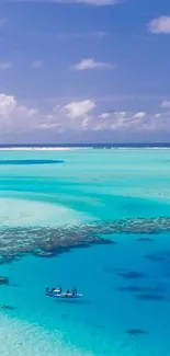 Aerial view of a tropical beach with turquoise waters and lush greenery.