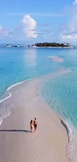 Couple walking on tropical beach with ocean view.