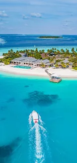 Aerial view of a tropical island with boat and turquoise water.