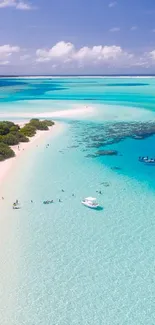 Aerial view of a tropical island with turquoise waters.