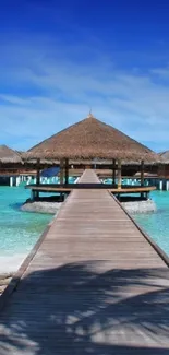 Overwater villa on a bright tropical island with clear blue skies.