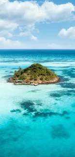 Tropical island surrounded by turquoise sea under a clear blue sky.