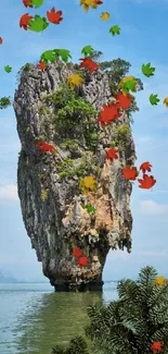 Tropical island with limestone rock and lush greenery in a blue sea.