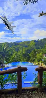 Scenic tropical pool with jets overhead in a vibrant blue sky.