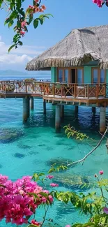 Tropical overwater bungalow in a serene sea setting with vibrant flowers.