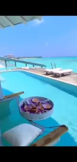 Floating breakfast by overwater villa with turquoise sea view.