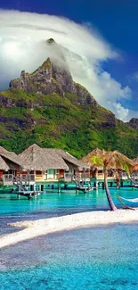 Gorgeous tropical paradise with ocean, beach, huts, and mountain under blue sky.